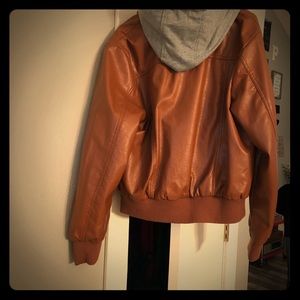A women’s size 2x pleather bomber jacket.